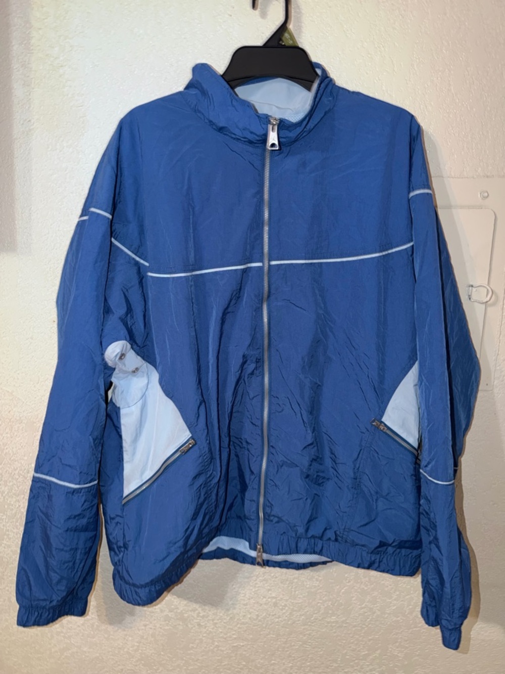 Jordan Men's Blue Windbreaker Jacket with Light Blue Accents